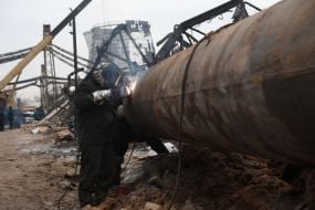 The aftermath of Russian missile strikes on the Darnitsa Thermal Power Plant in Kyiv