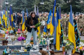 Girl with flowers on the Hill of Glory in Uzhhorod