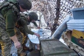 A soldier with a drone