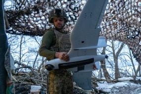 A soldier with a drone