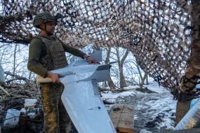 A soldier with a drone