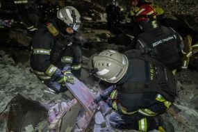 Search and rescue operations at the site of a Russian missile hitting a five-story residential building in the Kyivskyi district of Kharkiv