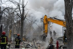 Search and rescue operations at the site of a Russian missile hitting a five-story residential building in the Kyivskyi district of Kharkiv