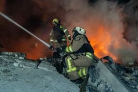 Fire extinguishing at the site of a Russian missile hitting a five-story residential building in the Kyivskyi district of Kharkiv