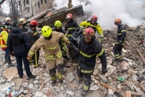Search and rescue operations at the site of a Russian missile hitting a five-story residential building in the Kyivskyi district of Kharkiv
