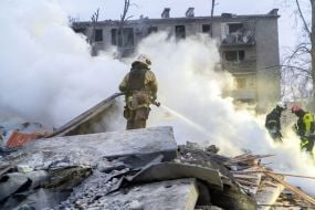 Fire extinguishing at the site of a Russian missile hitting a five-story residential building in the Kyivskyi district of Kharkiv