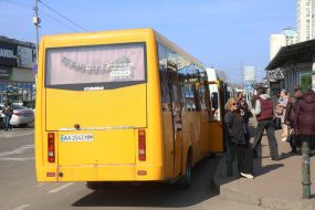 People get on a minibus