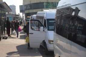 People get on a minibus