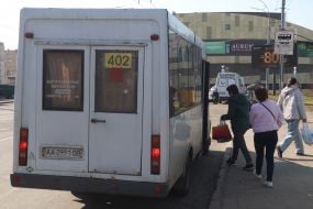 People get on a minibus