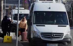 People near the minibus