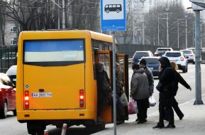 People get on a minibus