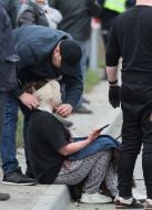 The victim is being given first aid