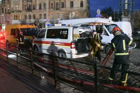 Ambulance doctors provide assistance to people after Russian drone attack in Lviv