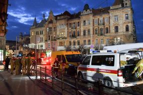 Ambulance doctors provide assistance to people after Russian drone attack in Lviv