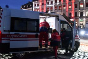 Ambulance doctors provide assistance to people after Russian drone attack in Lviv