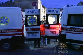 Ambulance doctors provide assistance to people after Russian drone attack in Lviv
