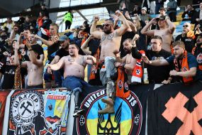 Fans of FC Shakhtar (Donetsk), including veterans, in the stands