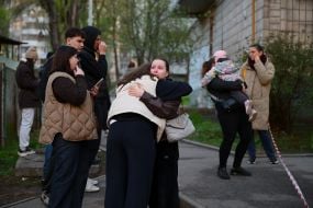 People near the house where the terrorist lived and set fire to the apartment