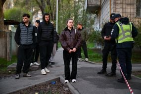 People near the house where the terrorist lived and set fire to the apartment