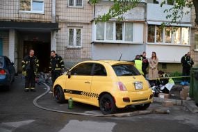 Rescuers near the house where the terrorist lived and set fire to the apartment