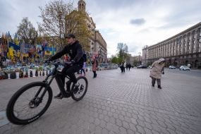 A man is riding a bicycle