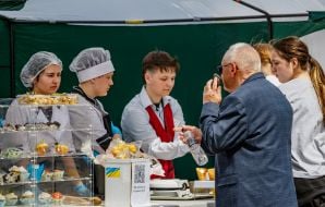 Visitors buy products from students at one of the vocational education institutions
