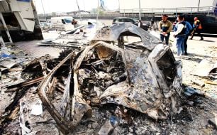 Cars damaged by shelling of Kyiv