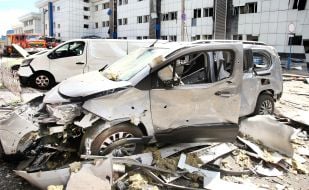 Cars damaged by shelling of Kyiv