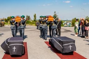 Honor guard during the solemn ceremony of meeting the coffin with the ashes of the colonel of the UNR Army and the leader of the OUN Andriy Melnyk