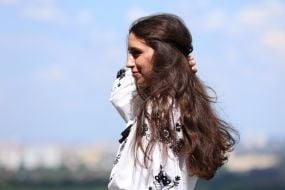 Girl in embroidered shirt
