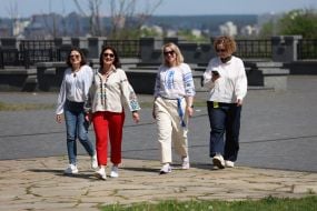 People in embroidered shirts