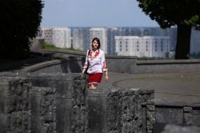 Woman in embroidered shirt