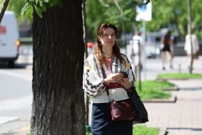 Woman in embroidered shirt