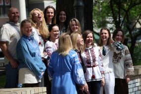 People in embroidered shirts