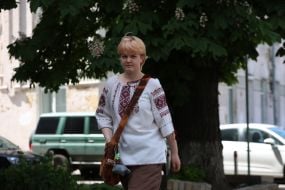 Girl in embroidered shirt