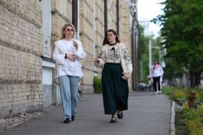People in embroidered shirts