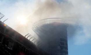 Пошкоджена будівля бізнес-центру у Шевченківському районі Києва