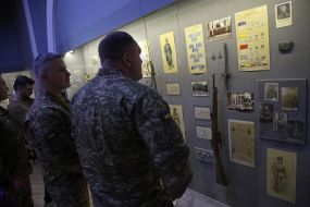 Oleksandr Pivnenko inspects the exhibits