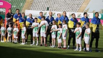 Players of FC Zorya (Luhansk) during the performance of the anthem