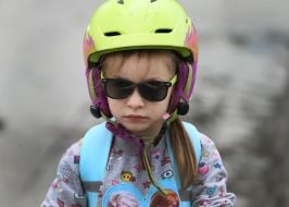 A girl participating in the charity bike ride "I pedal so they live"