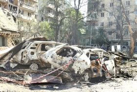 Згорілі внаслідок обстрілу Києва автомобілі