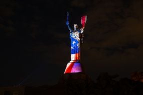 The Batkivshchyna-Mati monument in the colors of the American flag