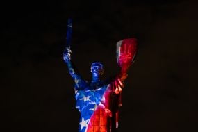 The Batkivshchyna-Mati monument in the colors of the American flag