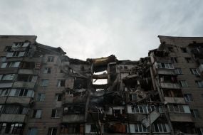 Partially destroyed high-rise building as a result of the delivery of a Russian missile in the Podilskyi district of Kyiv
