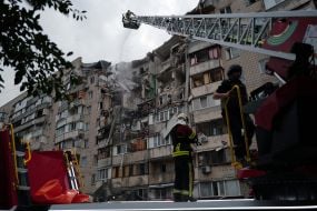 Partially destroyed high-rise building as a result of the delivery of a Russian missile in the Podilskyi district of Kyiv
