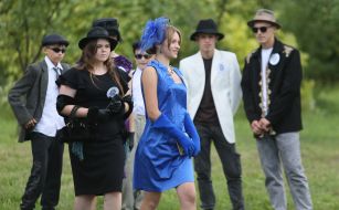 Guests of the youth festival "Retro Wave" in bright retro costumes