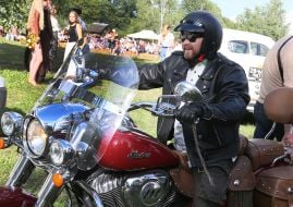 A biker on a retro motorcycle