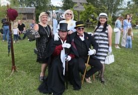 Guests of the youth festival "Retro Wave" in bright retro costumes