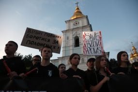 Participants of the open installation in memory of the fourth anniversary of the terrorist attack in Olenivka on Mykhailivska Square in Kyiv