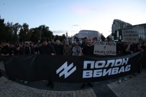 Participants of the open installation in memory of the fourth anniversary of the terrorist attack in Olenivka on Mykhailivska Square in Kyiv